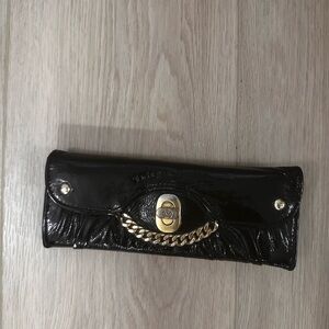 Elegant Black Clutch with Gold Accents